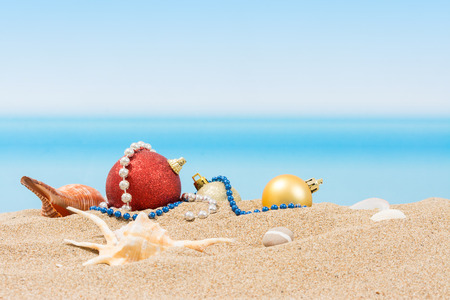 Christmas Tree Decorations On The Beach In Tropical Concept Of