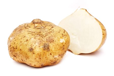 Yam bean cut into half isolated on white background.の写真素材