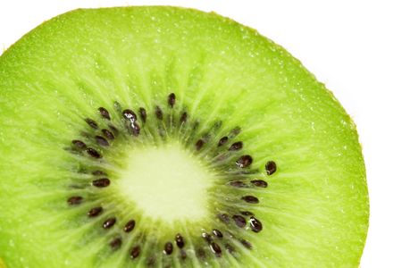 Macro photo of sliced kiwi fruit with seed.の写真素材