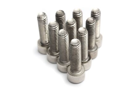 Ten bolt screws arranged in triangle shape on white background.