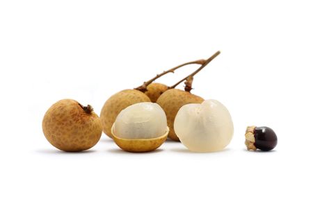 Close up of many longan isolated over white background.の写真素材