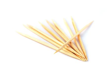 Close up of few tooth picks over white background.の写真素材