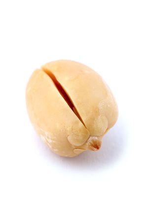 Close up of a peanut isolated on white background.