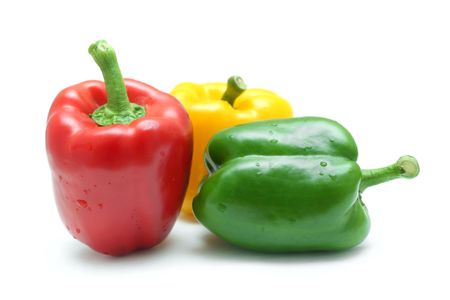 Close up of red, yellow and green pepper isolated on white background.の写真素材