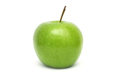 Close up of a green apple isolated on white background.の写真素材