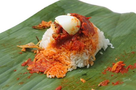 Close up of nasi lemak (Malaysia National Dish) isolated on white background.の写真素材