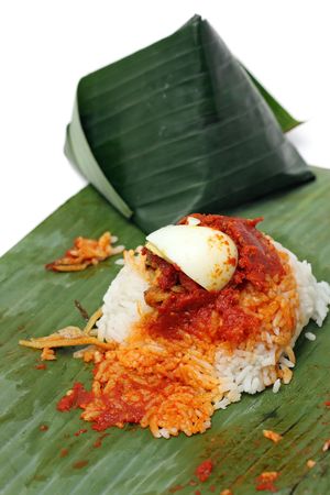 Close up of nasi lemak (Malaysia National Dish) isolated on white background.の写真素材