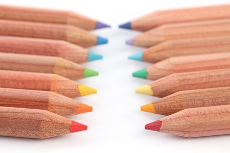 Close up of color pencils with different color over white background.の写真素材