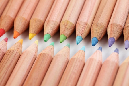 Close up of color pencils with different color over white background.の写真素材