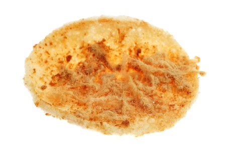 A piece of chicken floss cracker isolated on white background.の写真素材