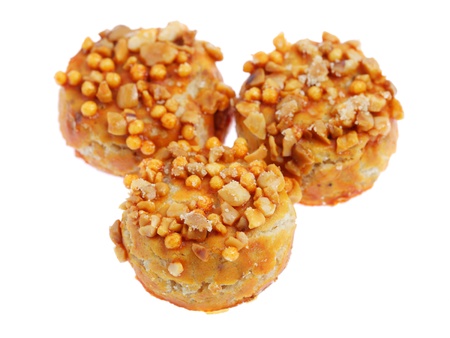 Close up of coated peanut cookie isolated on white background.の写真素材