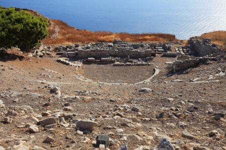 Ruin of theater of the Ancient Thira at the peak of Mesa Vouna Mountain, located at Santorini...