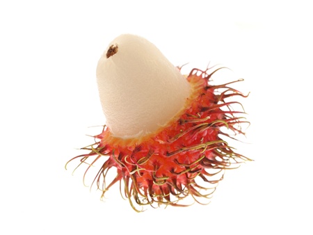 Close up of peepled rambutans put together over white background.の写真素材
