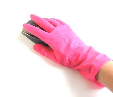 Hand in rubber glove with a computer mouse on white backgroundの写真素材