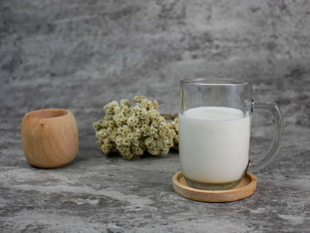 a glass of milk with a traditional theme. for the concept of healthy foodの写真素材
