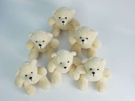 group of white teddy bears isolated on a white background. top viewの写真素材