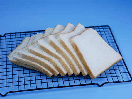 set of toast bread on pastel blue backgroundの写真素材