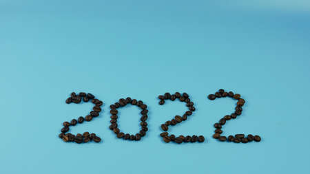 idea and creative number 2022, coffee beans on a blue backgroundの写真素材