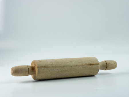 wooden rolling pin isolated on white background.の写真素材