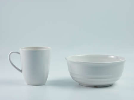 white bowl and mug isolated on white background.の写真素材