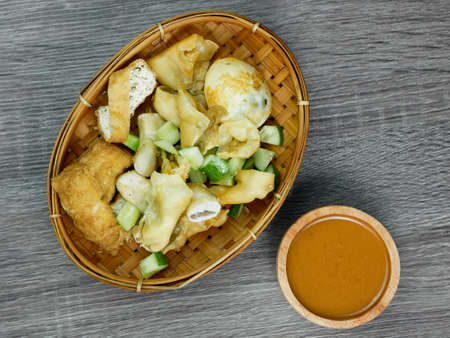 batagor or fried dumplings and peanut sauceの写真素材