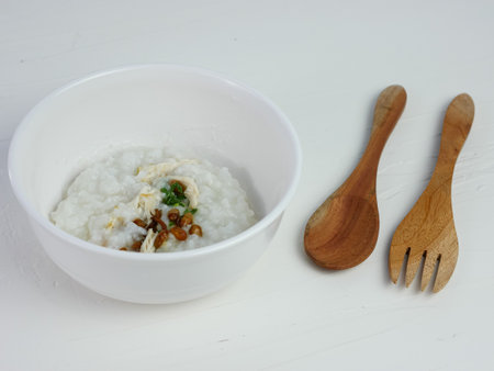 rice porridge in a bowl, on the table for breakfast in the morning.の写真素材