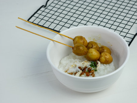 rice porridge in a bowl, on the table for breakfast in the morning.の写真素材