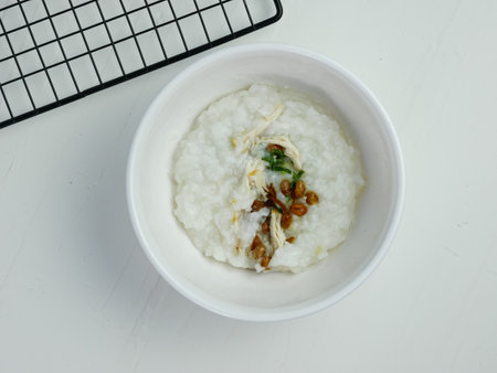 rice porridge in a bowl, on the table for breakfast in the morning.の写真素材