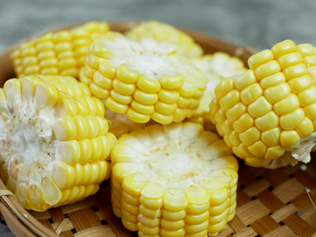 chopped raw corn on a bamboo plate