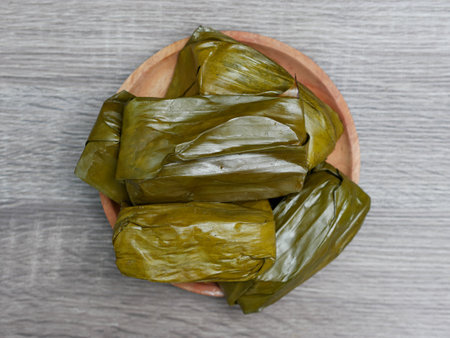 Buras or rice processed food filled with chopped chicken meat. Indonesian traditional foodの写真素材