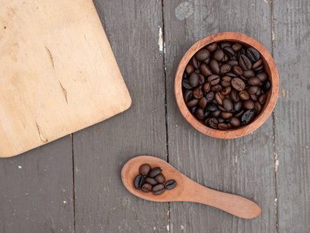 top view of coffee beans in wooden containerの写真素材