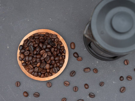 top view of french press coffee maker teapot and coffee beansの写真素材