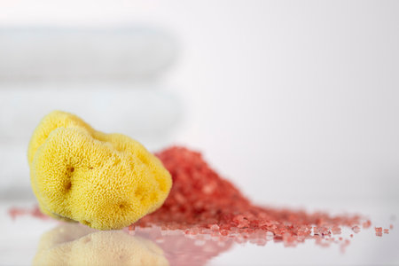 natural_yellow_sponge_with_rose_bath_saltの写真素材