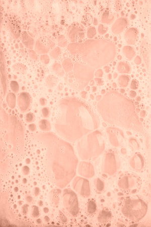 pink foaming soap backgroundの写真素材
