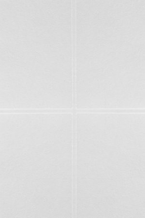 white paper with stamped cross backgroundの写真素材