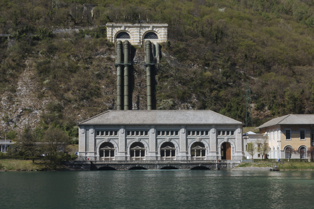 Hydroelectric central in Fadalto, Veneto. The plant is located in the municipality of Vittorio Veneto (TV)  on the right bank of Lake Restello. The plant, built by SADE in 1924 on the design of Vincenzo Ferniani, is divided into two factory bodies: the enのeditorial素材