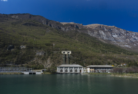 Hydroelectric central in Fadalto, Veneto. The plant is located in the municipality of Vittorio Veneto (TV)  on the right bank of Lake Restello. The plant, built by SADE in 1924 on the design of Vincenzo Ferniani, is divided into two factory bodies: the enのeditorial素材