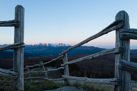 Monte Cavallo and Cima Manera in the background, seen from an old fence in Monte Pizzoc, Cansiglioの写真素材