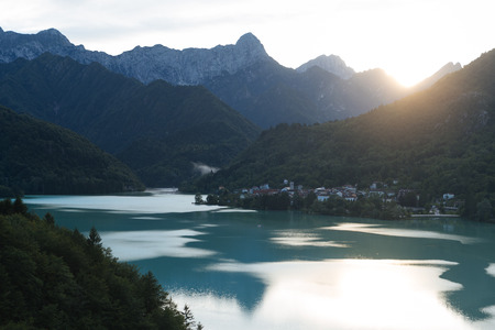 Barcis lake at sunset, with the village in the background. It was created in 1954 for the exploitation of hydroelectric power.の写真素材