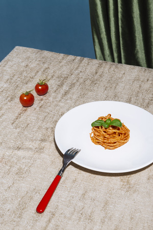 Italian recipe for pasta, wine, basil, tomatoesの写真素材