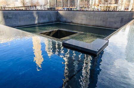 View of the 9 11 Memorial next to the One World trade centre in Manhattan, New Yorkのeditorial素材
