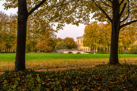 Garden at the back of Trinity College in autumn, Cambridge, UKの写真素材