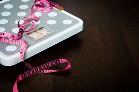 Side view of weight scale measure tap and scale machine. Diet and weight loss Concept.の写真素材