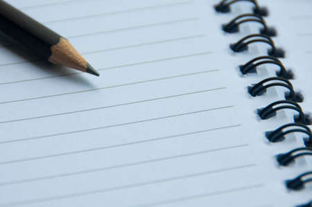 Blank notepad with pencil waiting for ideas. Copy space and office conceptの写真素材