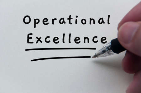 Hand writing operational excellence on notepad. Business conceptの写真素材