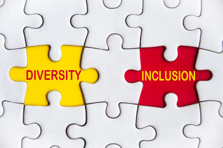 Diversity and inclusion text on missing jigsaw puzzle. Diversity and inclusion conceptの写真素材