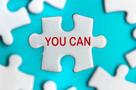 Close-up on text - You can on missing jigsaw puzzle. Motivational and inspirational concept