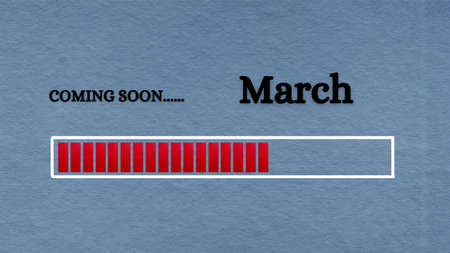 Top view of loading bar with text - Coming soon March. Light blue background. New month conceptの写真素材
