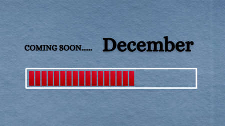 Top view of loading bar with text - Coming soon December. Light blue background. New month concept