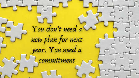 Top view of text on yellow cover - You do not need a new plan for next year. You need a commitment....
